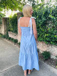 Woman modeling the back our our chambray dress