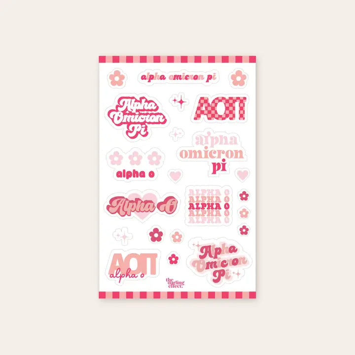 Up close photo showing a sheet of nine Alpha Omicron Pi stickers along with 13 flowers and stars all in different shades of red, light pink and peach