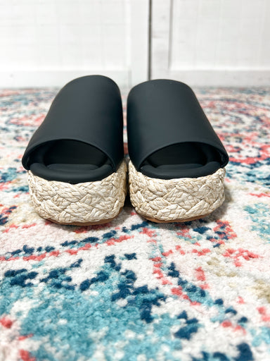 Front photo of our black wedge sandal