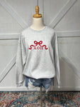 Up close photo of our AOPI bow design on an Ash Grey sweatshirt