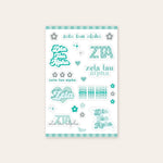 Up close photo showing a sheet of nine Zeta Tau Alpha stickers along with 13 flowers and stars all in different shades of turquoise